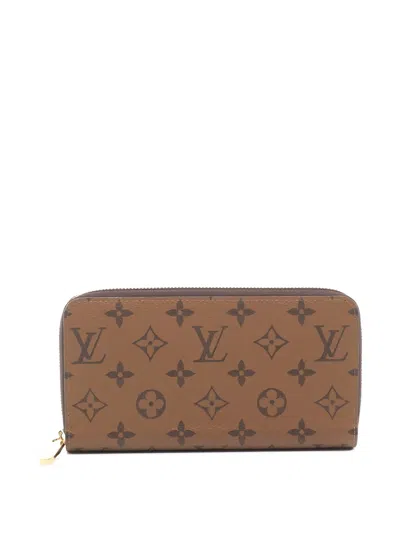 Pre-owned Louis Vuitton 2021s Zippy Monogram Reverse Wallet In Brown