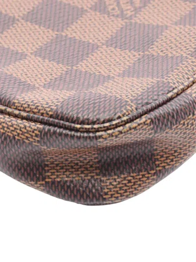 Pre-owned Louis Vuitton 2022 Damier Ebene Mini Pochette Accessoires Handbag In Brown