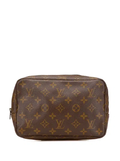 Pre-owned Louis Vuitton 20th Century Monogram Trousse Toilette 23 Clutch Bag