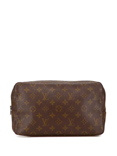 Pre-owned Louis Vuitton 20th Century Monogram Trousse Toilette 28 Clutch Bag In Brown