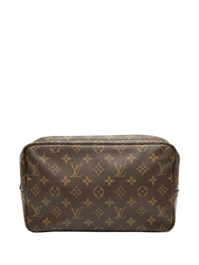 Pre-owned Louis Vuitton 20th Century Monogram Trousse Toilette 28 Clutch Bag In Brown