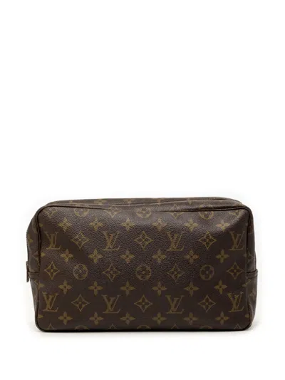 Pre-owned Louis Vuitton 20th Century Monogram Trousse Toilette 28 Clutch Bag In Brown