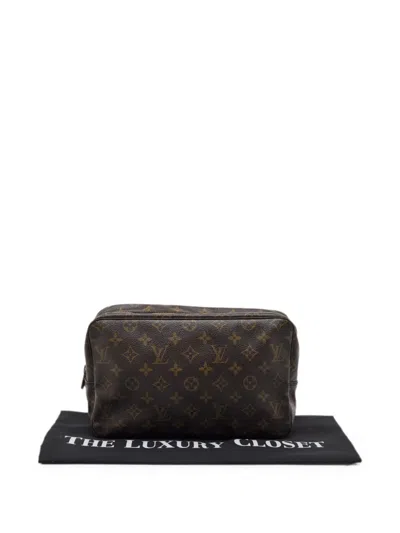 Pre-owned Louis Vuitton 28 Trousse Toilette Monogram Pouch In Brown