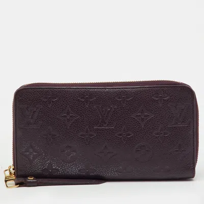 Pre-owned Louis Vuitton Aube Monogram Empreinte Leather Zippy Wallet In Purple