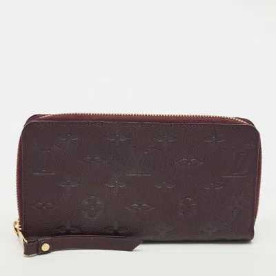 Pre-owned Louis Vuitton Aube Monogram Empreinte Leather Zippy Wallet In Purple