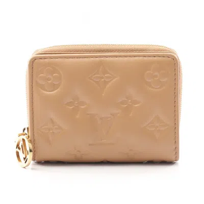 Pre-owned Louis Vuitton Beige Camel Leather Wallet (bi-fold) () In Brown