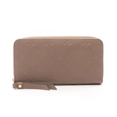Pre-owned Louis Vuitton Beige Tourterelle Leather Long Wallet (bi-fold) () In Brown