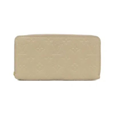 Pre-owned Louis Vuitton Beige Tourterelle Leather Long Wallet (bi-fold) () In Brown