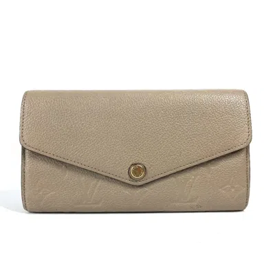 Pre-owned Louis Vuitton Beige Tourterelle Monogram Empreinte Long Wallet (bi-fold) () In Brown