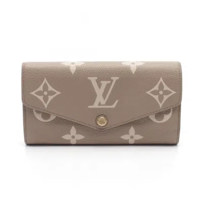 Pre-owned Louis Vuitton Beige Tourterelle Monogram Empreinte Long Wallet (bi-fold) () In Brown