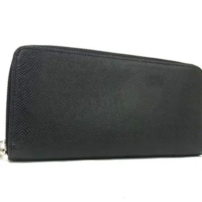 Pre-owned Louis Vuitton Black Noir Taiga Leather Long Wallet (bi-fold) ()