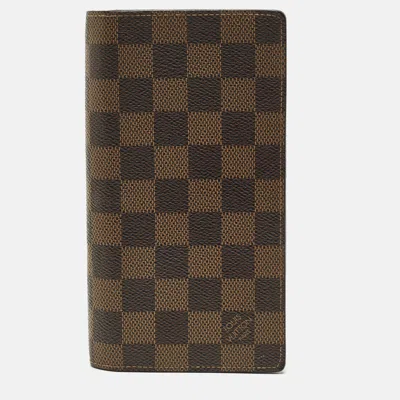 Pre-owned Louis Vuitton Brazza Damier Ebene Canvas Wallet In Brown