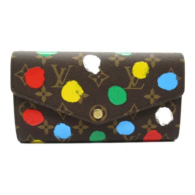 Pre-owned Louis Vuitton Brown Coated Canvas Monogram Pvc Long Wallet (bi-fold) ()