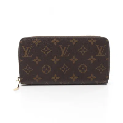 Pre-owned Louis Vuitton Brown Coated Canvas Monogram Pvc Long Wallet (bi-fold) ()