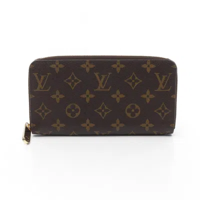 Pre-owned Louis Vuitton Brown Coated Canvas Monogram Pvc Long Wallet (bi-fold) ()