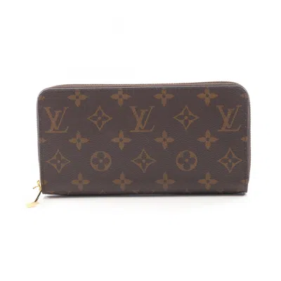 Pre-owned Louis Vuitton Brown Coated Canvas Pvc Long Wallet (bi-fold) ()