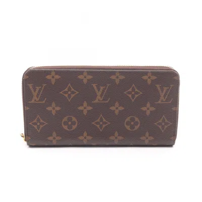 Pre-owned Louis Vuitton Brown Coated Canvas Pvc Monogram Long Wallet (bi-fold) ()