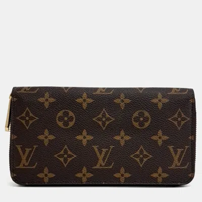 Pre-owned Louis Vuitton Brown Pvc Monogram Zippy Wallet