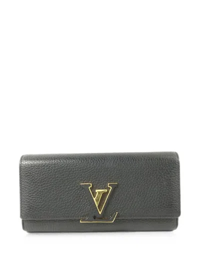 Pre-owned Louis Vuitton Capucines Leather Wallet In Black