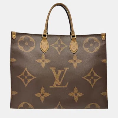 Pre-owned Louis Vuitton Coated Canvas Brown Gold Monogram Giant Reverse On The Go Gm Handbag