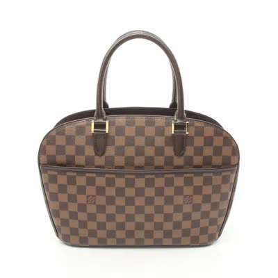 Pre-owned Louis Vuitton Coated Canvas Leather Handbag () In Brown