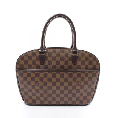 Pre-owned Louis Vuitton Coated Canvas Pvc Leather Handbag () In Brown