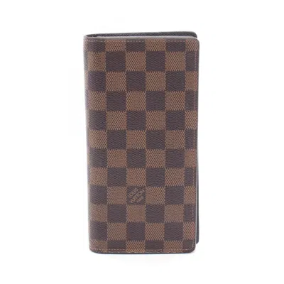 Pre-owned Louis Vuitton Damier Brown Ebene Coated Canvas Pvc Damier Canvas Long Wallet (bi-fold) ()
