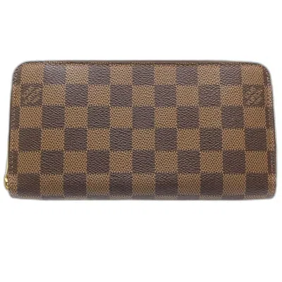 Pre-owned Louis Vuitton Damier Canvas Ebene Canvas Long Wallet (bi-fold) () In Brown