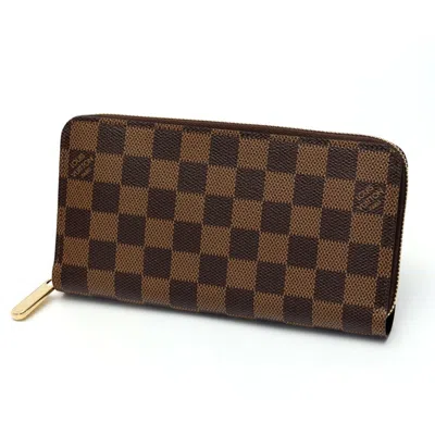 Pre-owned Louis Vuitton Damier Canvas Ebene Damier Canvas Long Wallet (bi-fold) () In Brown