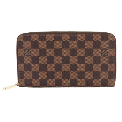 Pre-owned Louis Vuitton Damier Canvas Ebene Damier Canvas Long Wallet (bi-fold) () In Brown