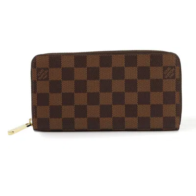 Pre-owned Louis Vuitton Damier Canvas Ebene Damier Canvas Long Wallet (bi-fold) () In Brown