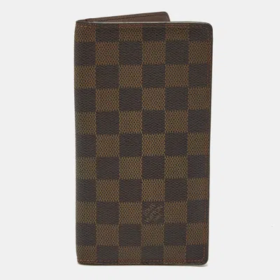 Pre-owned Louis Vuitton Damier Ebene Canvas Brazza Wallet In Brown