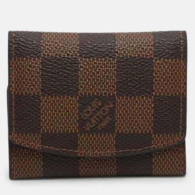 Pre-owned Louis Vuitton Damier Ebene Canvas Cuffs Case In Brown
