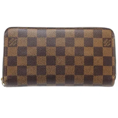 Pre-owned Louis Vuitton Damier Ebene Canvas Long Wallet (bi-fold) () In Brown