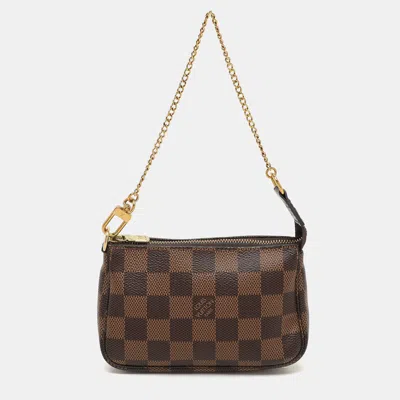 Pre-owned Louis Vuitton Damier Ebene Canvas Mini Pochette Accessoires Bag In Brown