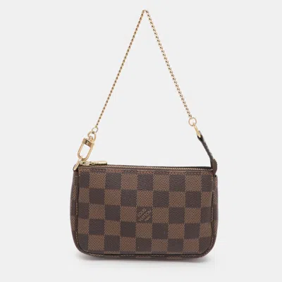 Pre-owned Louis Vuitton Damier Ebene Canvas Mini Pochette Accessoires Bag In Brown