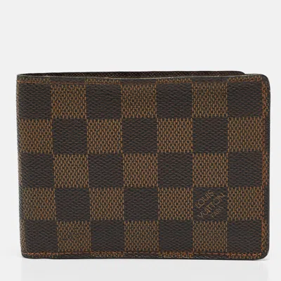 Pre-owned Louis Vuitton Damier Ebene Canvas Multiple Wallet In Brown