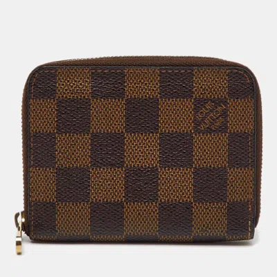 Pre-owned Louis Vuitton Damier Ebene Canvas Zippy Coin Purse In Brown