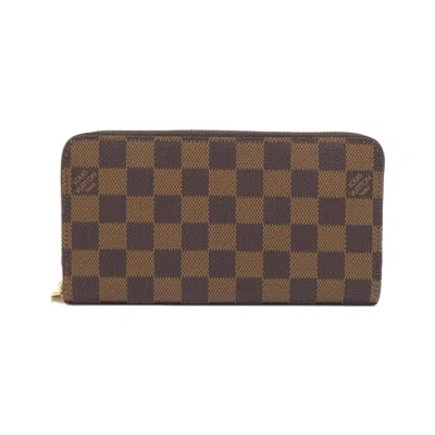 Pre-owned Louis Vuitton Damier Ebene Coated Canvas Long Wallet (bi-fold) () In Brown