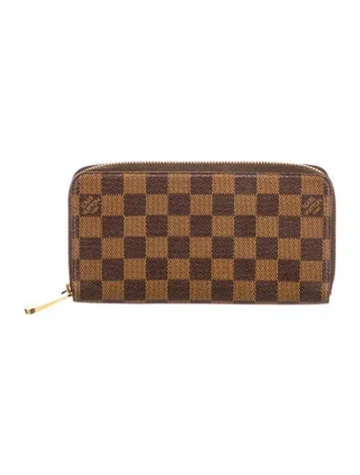Pre-owned Louis Vuitton Damier Ebene Pattern Coated Canvas Compact Wallet In Brown