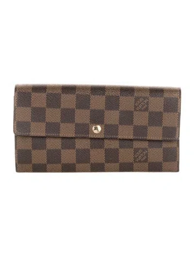 Pre-owned Louis Vuitton Damier Ebene Pattern Coated Canvas Sarah Wallet In Brown