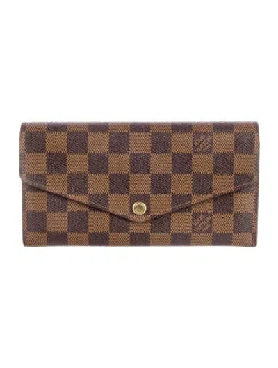 Pre-owned Louis Vuitton Damier Ebene Pattern Coated Canvas Sarah Wallet In Brown