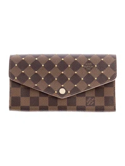 Pre-owned Louis Vuitton Damier Ebene Pattern Coated Canvas Sarah Wallet In Brown