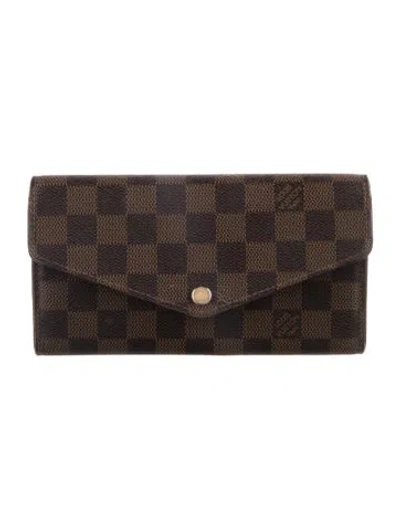 Pre-owned Louis Vuitton Damier Ebene Pattern Coated Canvas Sarah Wallet In Brown