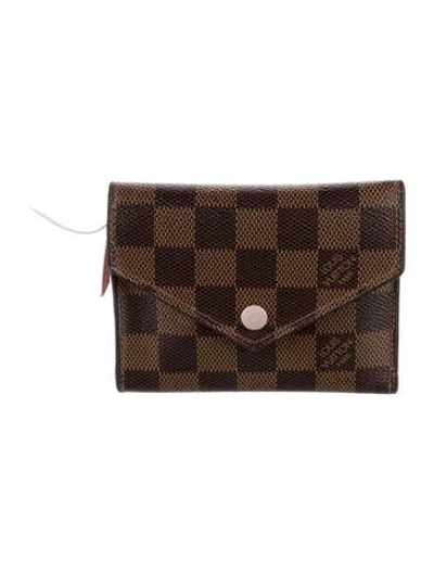 Pre-owned Louis Vuitton Damier Ebene Pattern Coated Canvas Victorine Wallet In Brown