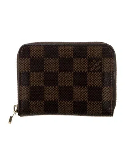 Pre-owned Louis Vuitton Damier Ebene Pattern Coated Canvas Zippy Coin Purse In Brown