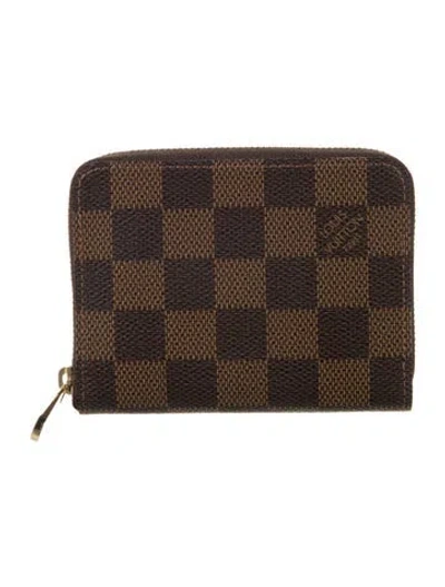 Pre-owned Louis Vuitton Damier Ebene Pattern Coated Canvas Zippy Coin Purse In Brown