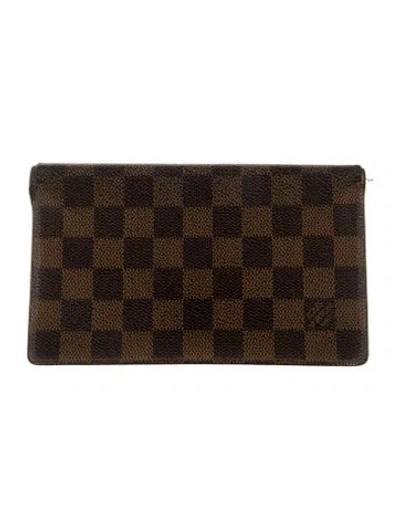 Pre-owned Louis Vuitton Damier Ebene Pattern Coated Canvas Zippy Wallet In Brown
