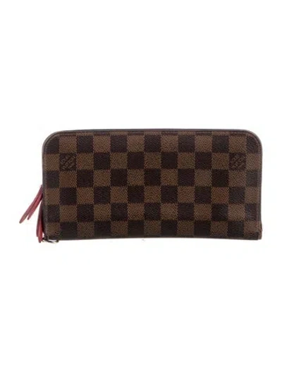 Pre-owned Louis Vuitton Damier Ebene Pattern Coated Canvas Zippy Wallet In Brown