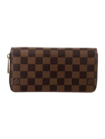 Pre-owned Louis Vuitton Damier Ebene Pattern Coated Canvas Zippy Wallet W/ Tags In Brown